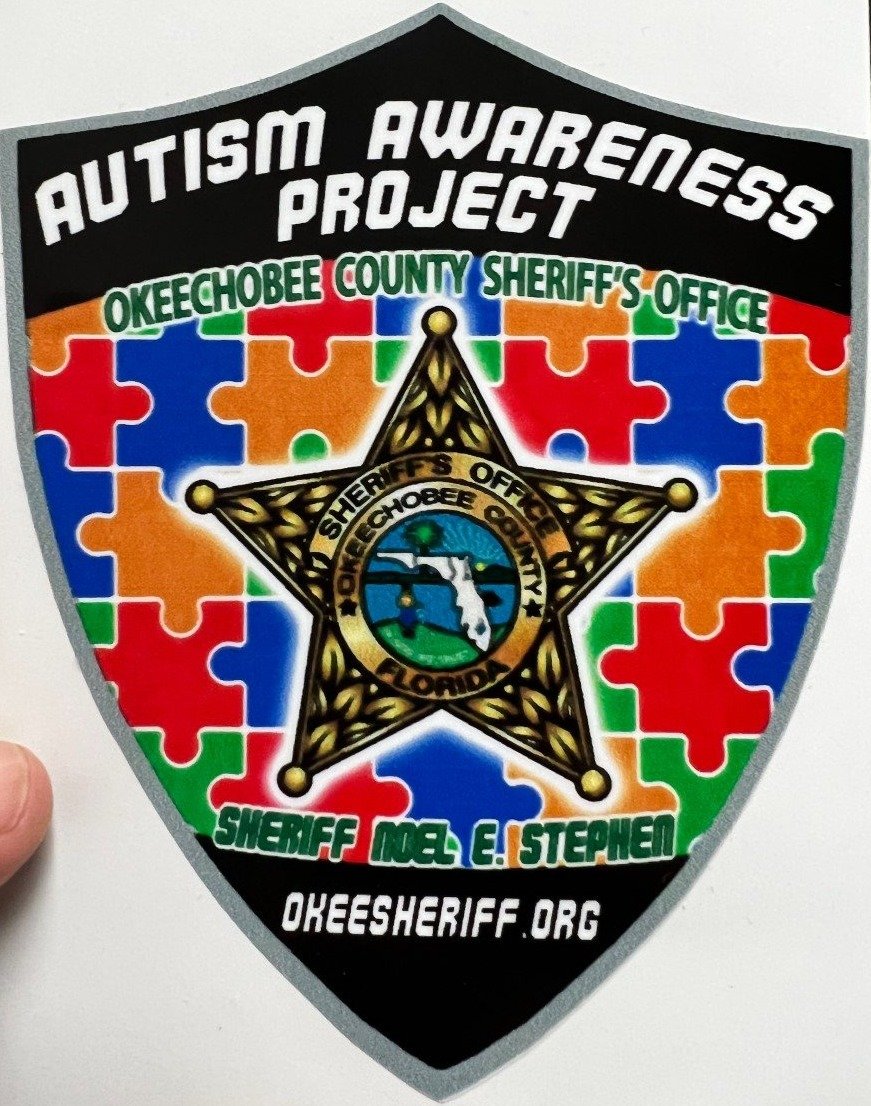 Okeechobee County Sheriff's Office marked patrol units now have Autism Awareness Project stickers.